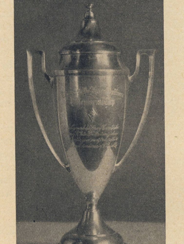 Black and white historical photograph of an engraved Pi Beta Phi trophy cup with handles