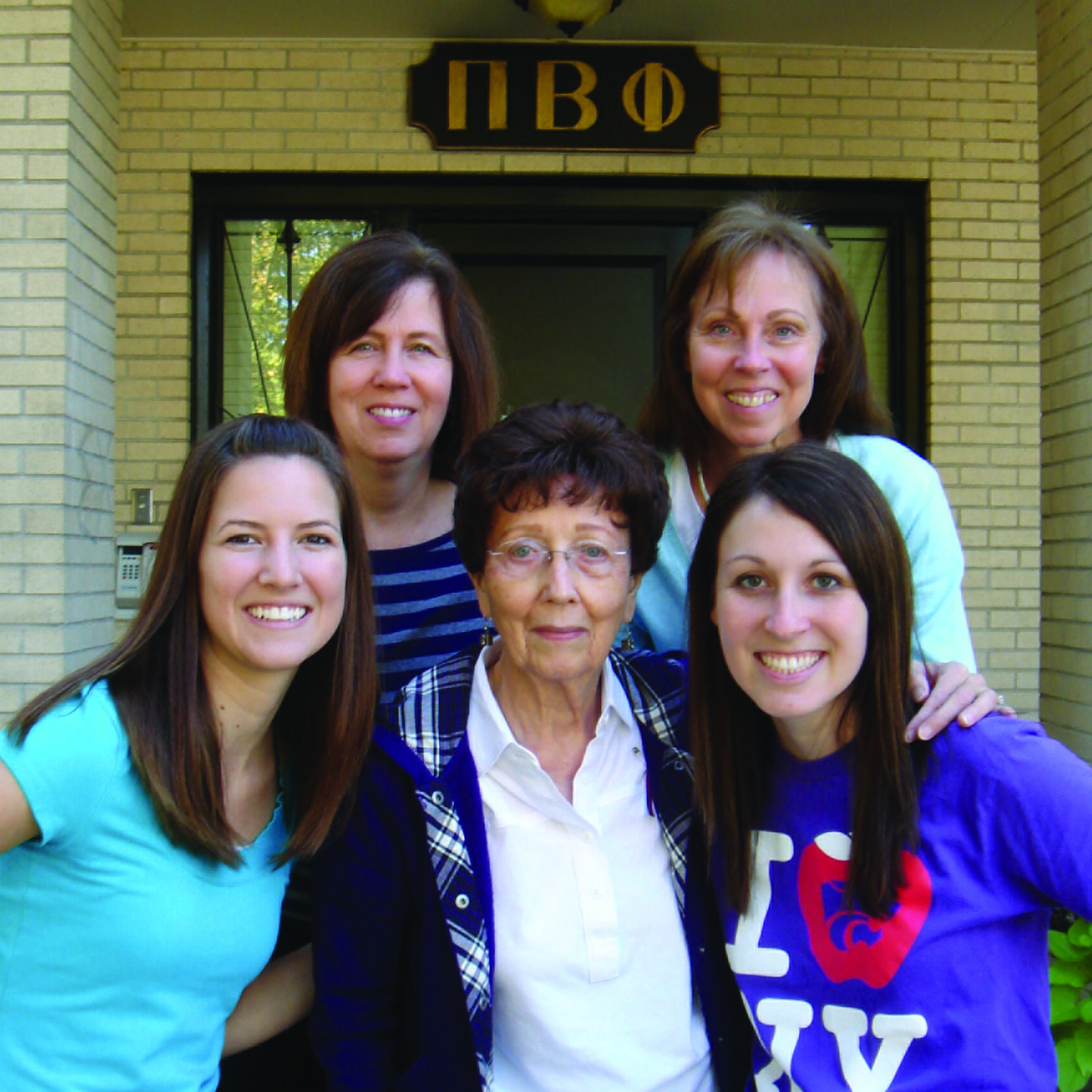 Photo of four women surrounding Marion Weltsh