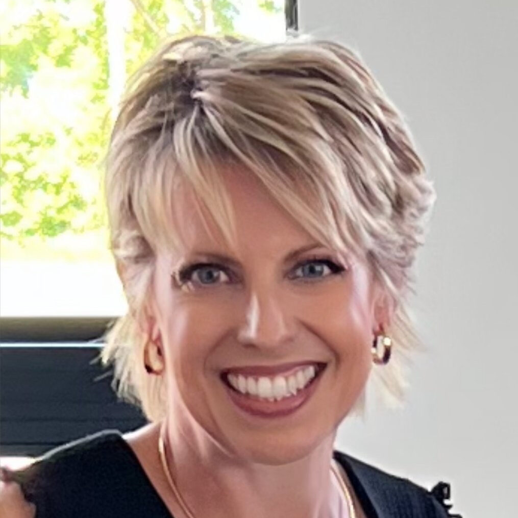 Photo of Sharon Battis wearing a black blouse
