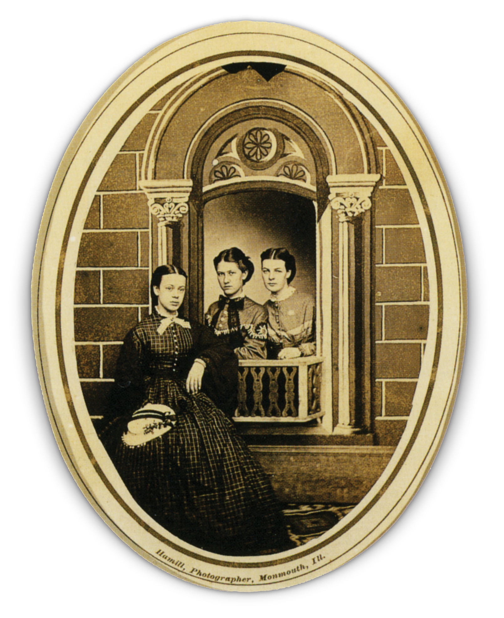 Three members posing for a photograph in a golden frame
