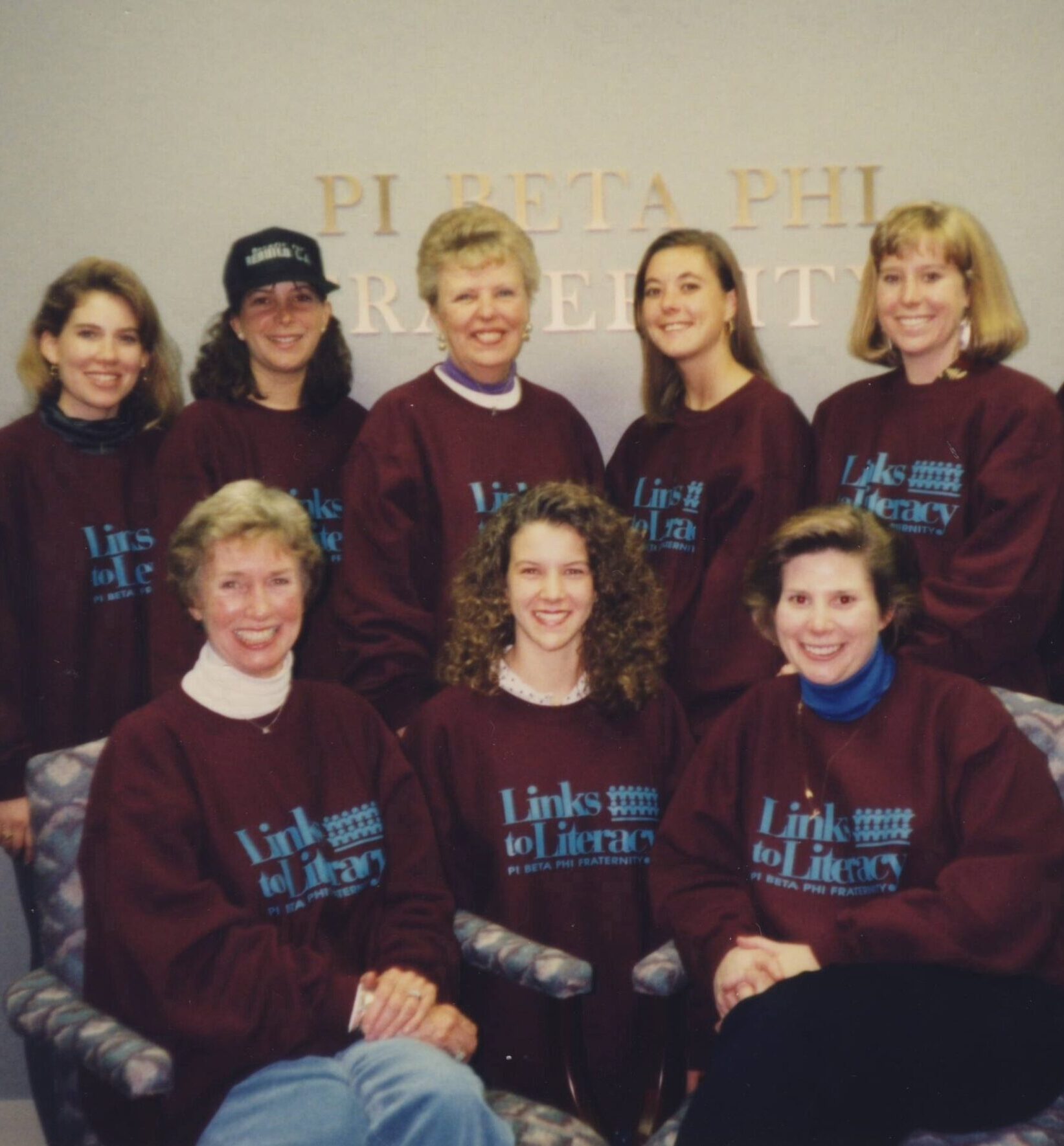 Several members wearing sweatshirts that say Links to Literacy