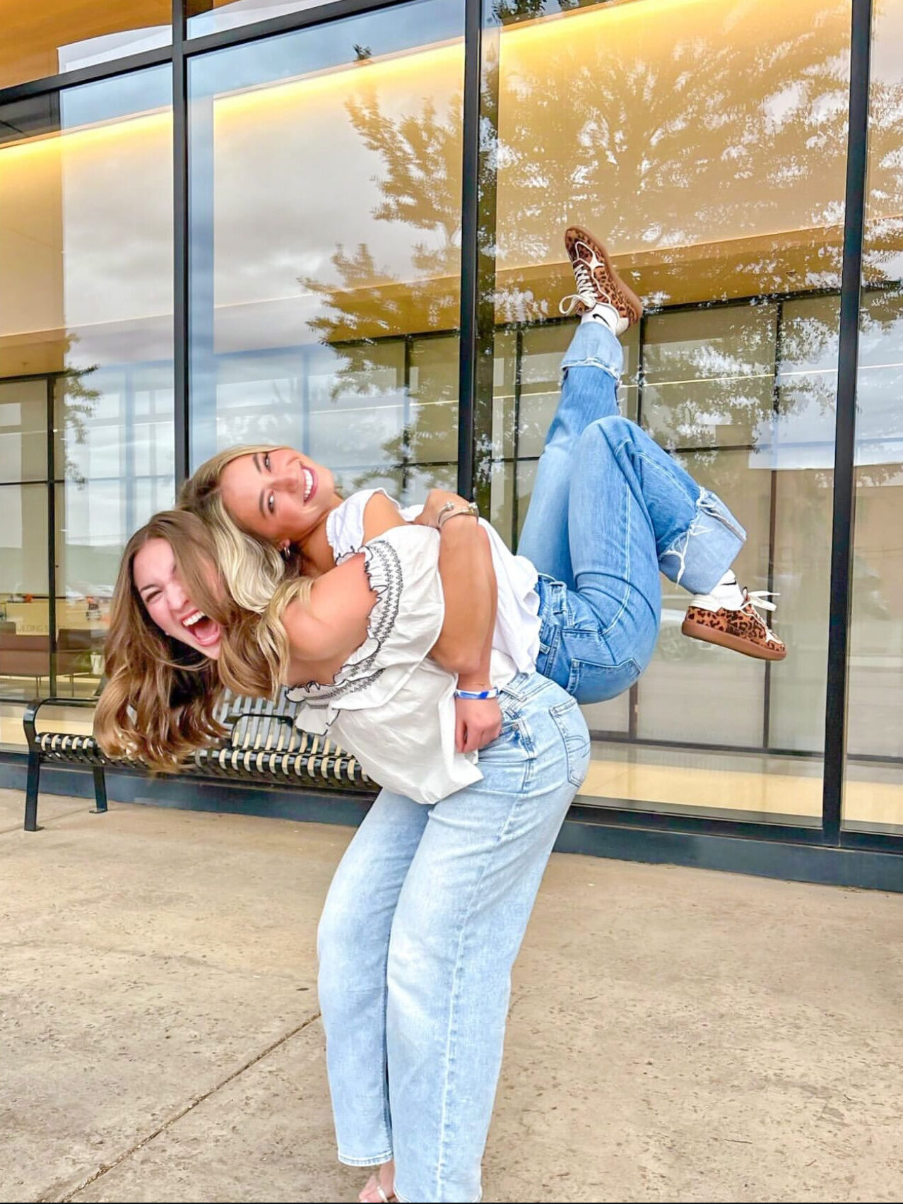 One member holding another member on her back