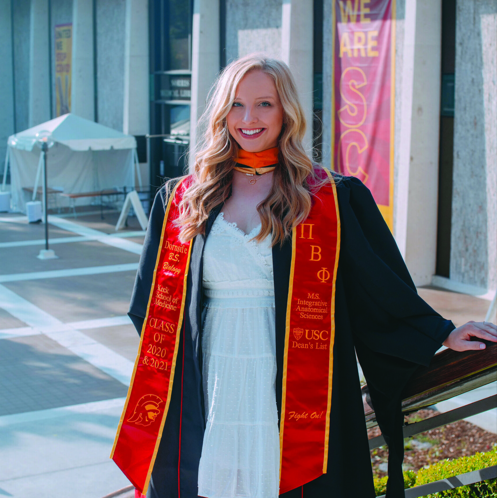 Photo of Bethany Beatty wearing a graduation gown and stole